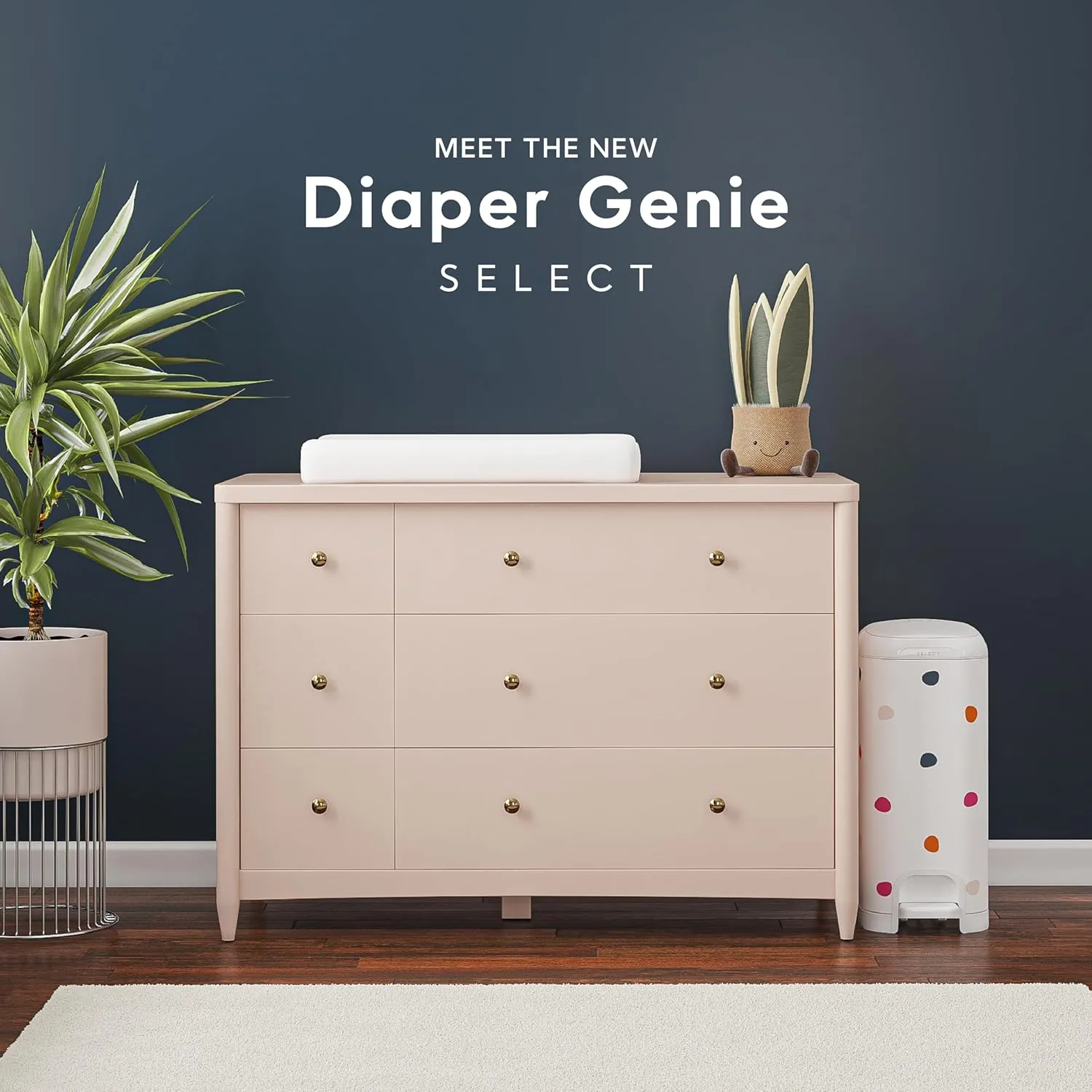 Diaper Genie Select Pail (Multi-Color Polka Dot) is Made of Durable Stainless Steel and Includes 1 Starter Square Refill That can Hold up to 165 Newborn-Sized Diapers.