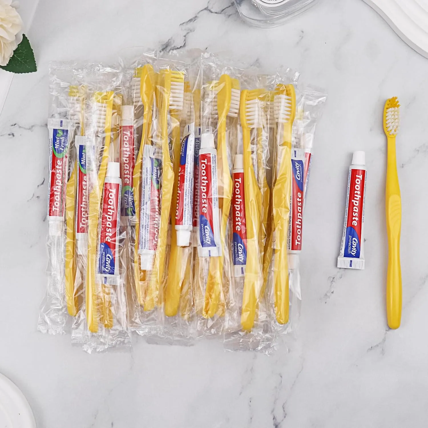 Disposable Toothbrushes with Toothpaste Pack of 200, Yellow Hollow Toothbrush with 10g Toothpaste Individually Wrapped Disposable Travel Toothbrushes Kit in Bulk for Homeless,Airbnb,Hotel,Charity