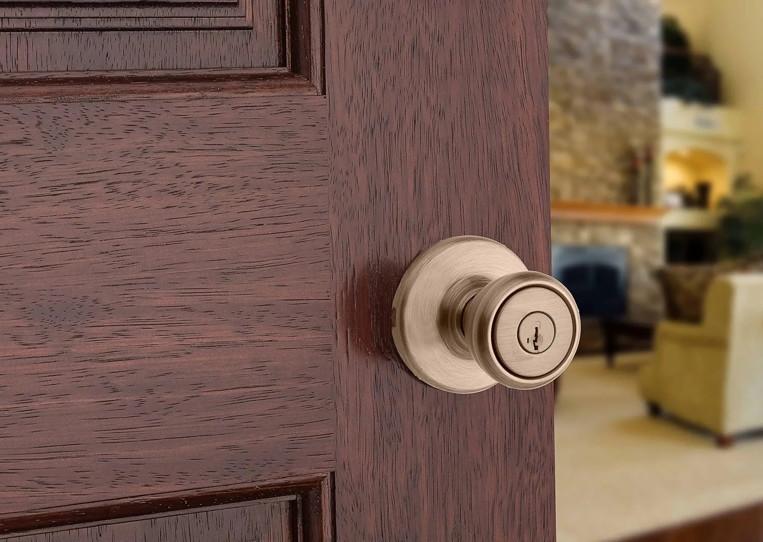 Kwikset Tylo Entry Door Knob with Lock and Key, Secure Keyed Handle Exterior, Front Entrance and Bedroom, Antique Brass, Pick Resistant SmartKey Rekey Security and Microban
